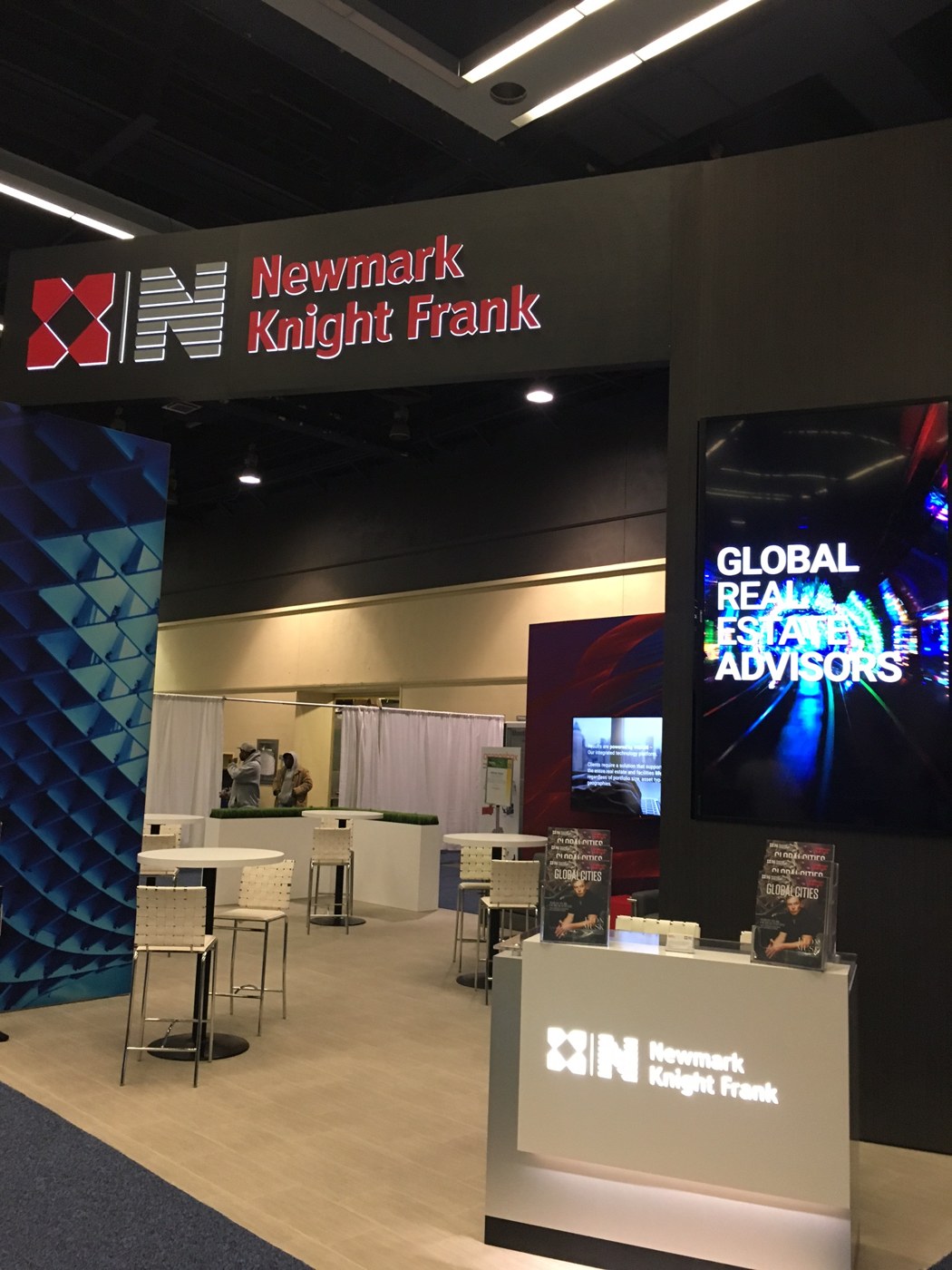 Newmark Knight Frank branded booth at CoreNet Global